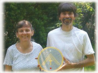 Tom & Nancy holding The Temple of God Healing Disc